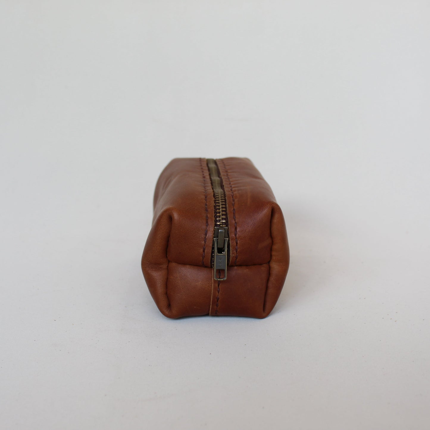 leather utility case in cognac