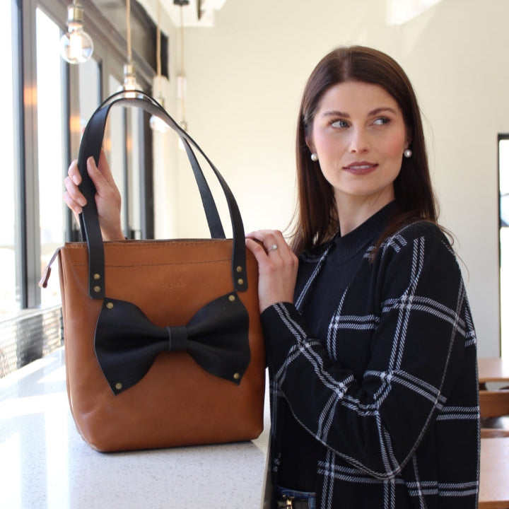 Jani bow tote in tan with black bow