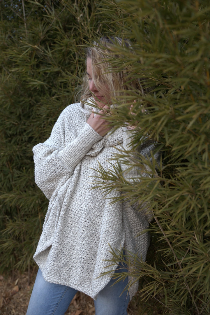 Model wearing cotton poncho