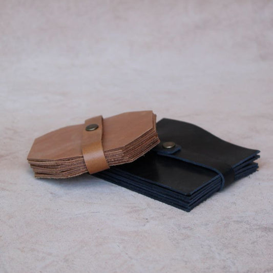 Leather coasters in tan and black
