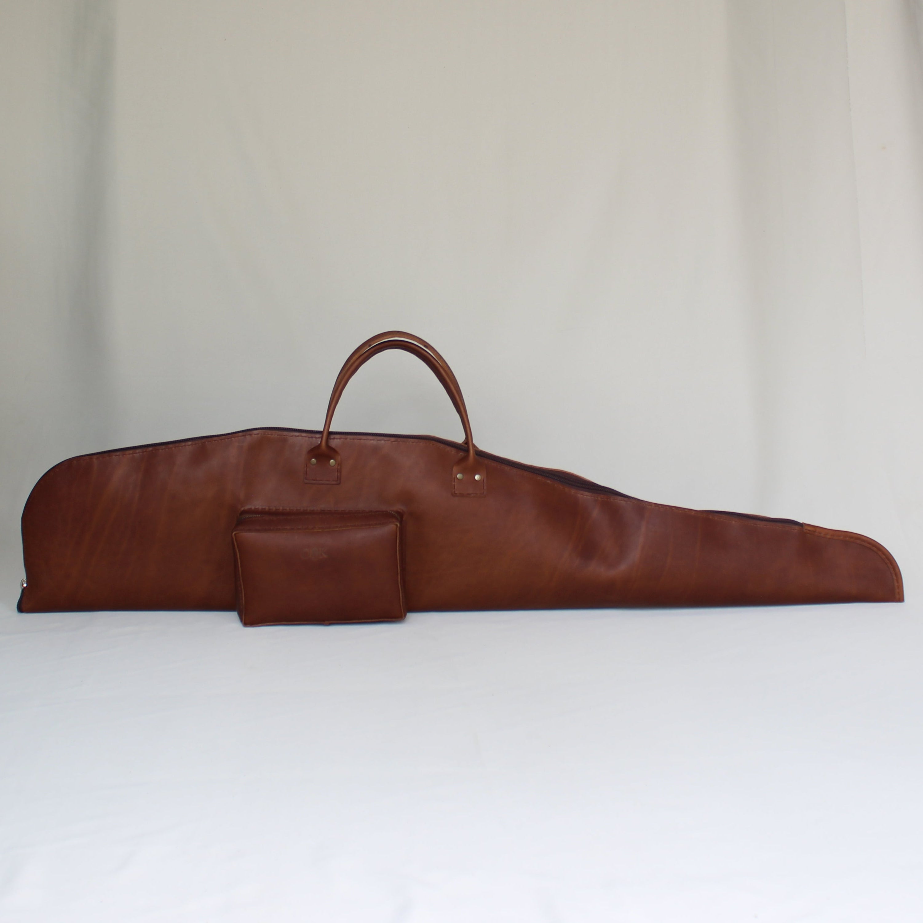 Leather Rifle Bag - Cognac lined with high density foam and suede, zip pocket edition