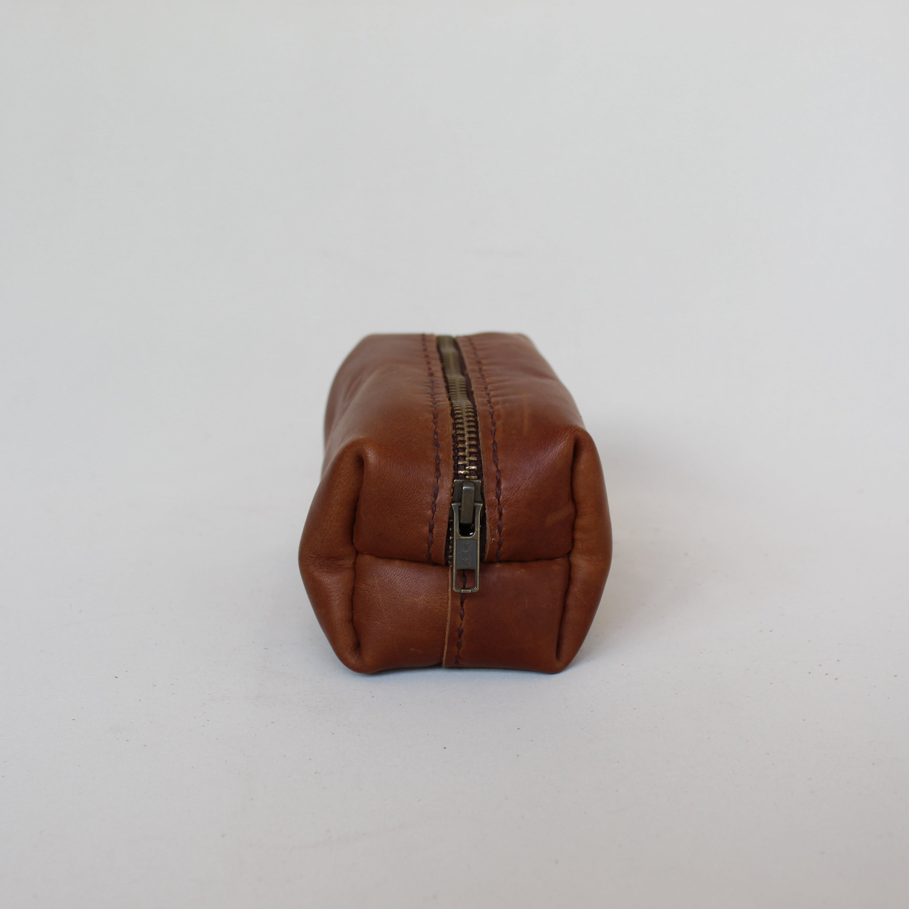 leather utility case in cognac