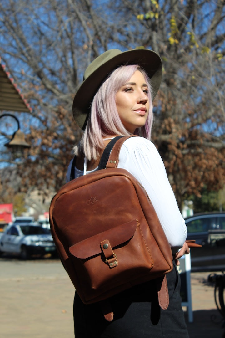 Leather round backpack in cognac