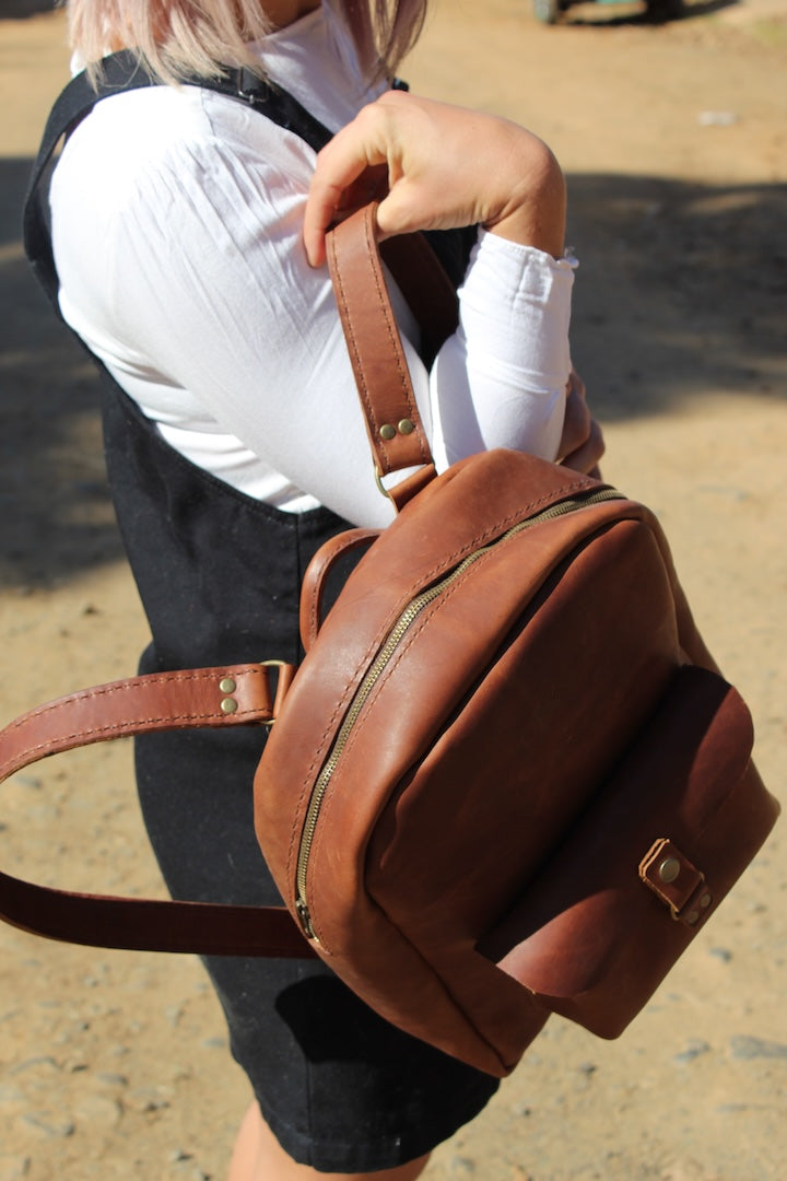 Leather round backpack in tan