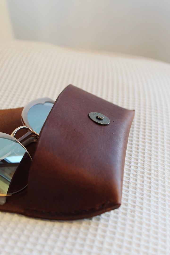 Leather sunglasses case in cognac